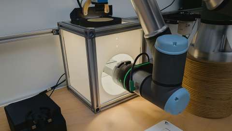 Roboter in Kamerabox