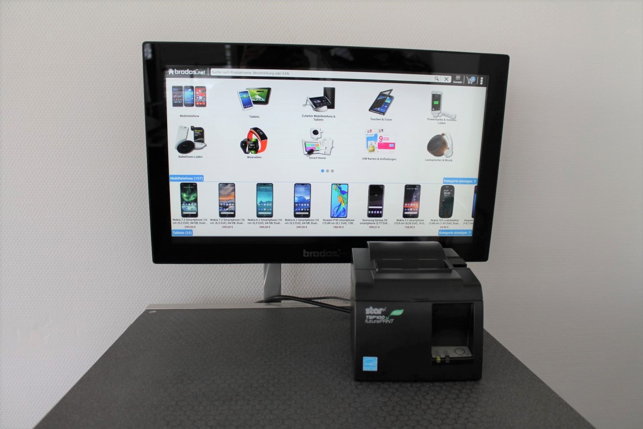 Kiosksystem mit Bildschirm und Produktanzeige