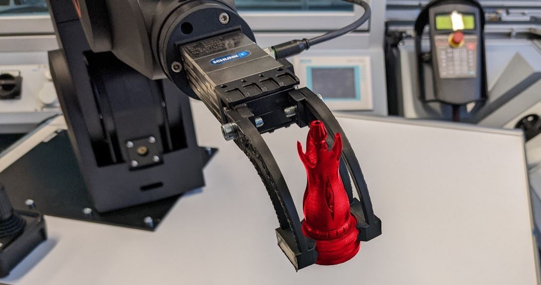 Das Bild veranschaulicht den Demonstrator 3D-Druck zur Entwicklung und Herstellung individueller und gewichtsoptimierter Robotergreifer.